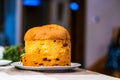 Selective focus shot of a slice of a cake with raisins on a white plate Royalty Free Stock Photo