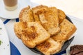 Selective focus shot of a toasted bread basket on a wooden stand Royalty Free Stock Photo