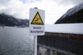 Selective focus shot of a warning sign in Germany