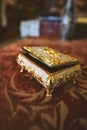 Selective focus, Of a small golden jewelry box Royalty Free Stock Photo