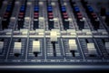 Selective focus sound mixer background. Royalty Free Stock Photo