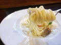 Selective focus of spaghetti carbonara with cream sauce on white plate Royalty Free Stock Photo