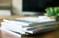 selective focus of stacking magazine place on table in living Royalty Free Stock Photo