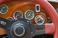 Selective focus of steering wheel and dashboard of classic car