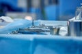 Selective focus surgical instrument lying on table, emergency case, surgery, medical technology, health care cancer Royalty Free Stock Photo