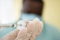 Selective focus of syringe, African American Wear a medical mask and being covid vaccinated for the prevention of coronavirus and