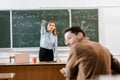 Selective focus of teacher showing something Royalty Free Stock Photo