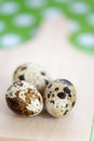 Selective focus on three raw quail eggs Royalty Free Stock Photo