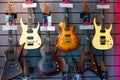 Selective focus to electric guitar in guitar shop, many guitars, pop rock artist song music and entertainment instrument Royalty Free Stock Photo