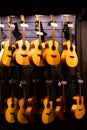 Selective focus to guitar in music shop, many guitars, pop rock artist song music and entertainment instrument