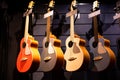 Selective focus to guitar in music shop, many guitars, pop rock artist song music and entertainment instrument Royalty Free Stock Photo