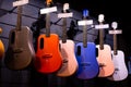 Selective focus to guitar in music shop, many guitars, pop rock artist song music and entertainment instrument