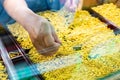 Selective focus to hand holding gold jewelry, customers are buying gold jewelry in the gold shop Royalty Free Stock Photo