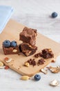 Pieces of chocolate brownie with peanuts Royalty Free Stock Photo
