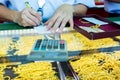 Selective focus to staff is writing sale order of gold jewelry in the gold shop