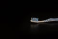 Selective focus on toothbrush isolated on black background Royalty Free Stock Photo