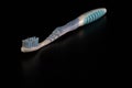 Selective focus on toothbrush isolated on black background Royalty Free Stock Photo