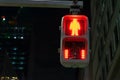 Selective focus on traffic red light for people, pedestrian and human to stop and wait and red dot counting down for green light Royalty Free Stock Photo