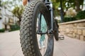 Selective focus on tubeless tire of an electric motor bike, mountain bike. Shallow tread of a bicycle tubeless tire