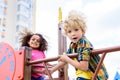 selective focus of two multiethnic little kids having fun Royalty Free Stock Photo