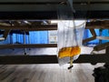 Selective focus of urine or pee catheter bag hang under patient bed in hospital