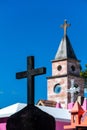 Selective focus vertical shot of a stone tombstone cross in a cemetery in Chiapas, Mexico Royalty Free Stock Photo