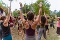 Diverse people dance at earth festival