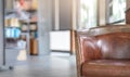 Selective focus of vintage leather chair in coffee shop Royalty Free Stock Photo