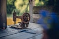 Selective focus of a vintage rusty sewing machine on a wooden board Royalty Free Stock Photo