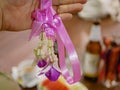 A welcome flower garland received before a meal at Khantok dinner - Northern Thai style meal which guests sit on the floor