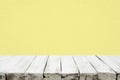 selective focus.white empty of wood table top on yellow pastel color background.F Royalty Free Stock Photo
