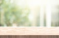 Selective focus.Wood table counter on blur green garden garden from window view background Royalty Free Stock Photo