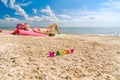 Selective focus on the word Happy on the background of a tanning girl. Royalty Free Stock Photo