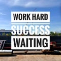 Selective focus.Word WORK HARD SUCCESS WAITING with blue sky and work place background.Shot were noise and film grain. Royalty Free Stock Photo