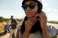 Selective focus on young african american girl putting helmet Royalty Free Stock Photo