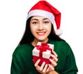 Selective focus Young beautiful asian woman wore green sweater and santa hat,Excited, surprised and happy, Holding a gift box with Royalty Free Stock Photo
