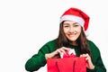 Selective focus Young beautiful asian woman wore green sweater and santa hat,Excited, surprised and happy, Holding a gift box with Royalty Free Stock Photo