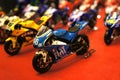 Selective focused on MotoGP`s miniature scale motorcycle models.