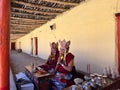 Selective of monks praying in a Monastery known as Sakya Tangyud Monastery