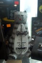 Selective focus of musical classic metronome in form of funny cat