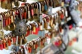 Selective shot of metal locks left by people on a bridge In Ljubljana, Slovenia - keep a dream Royalty Free Stock Photo