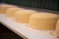Selective shot of multiple marzipan cakes on the table. Baker making cakes at Waagan bakery, Tynset Royalty Free Stock Photo