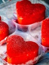 Selective shot of stunning heart shaped cookies with red toppings