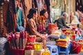 Selective shot of Vietnamese Women selling things in the local native market