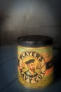 Selective sof focuse photo of Antique John Player & Sons Player`s Navy Cut