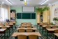 Selective soft and blur focus.old wooden row lecture chairs in classroom in poor school.study room without student.concept for Royalty Free Stock Photo