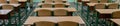 Selective soft and blur focus.old wooden row lecture chairs in classroom in poor school.study room without student.concept for Royalty Free Stock Photo