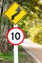 Selective speed limit traffic sign 10 and winding road caution symbol for safety drive in country road