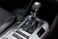 Selector automatic transmission with leather in the interior of a modern expensive car. The background is blurred Royalty Free Stock Photo