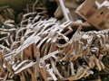 Selelctive focus close up image of brown shredded paper filler for postal package. Royalty Free Stock Photo